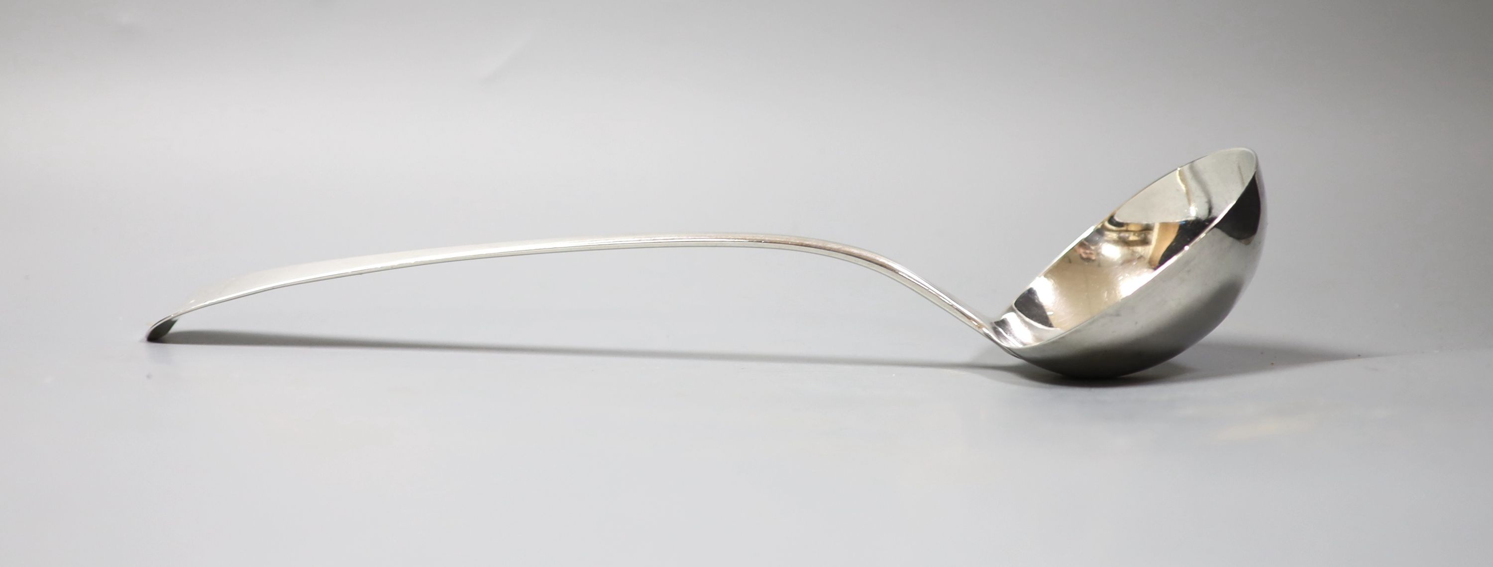 A George III silver Old English pattern soup ladle, Eley & Fearn, London, 1818, 177 grams, 33.9cm.